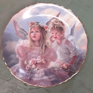 Vintage 1996 "Sharing Secrets" collectible plate by Sandra Kuck